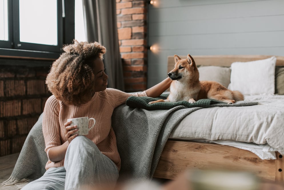 Woman Petting her Dog